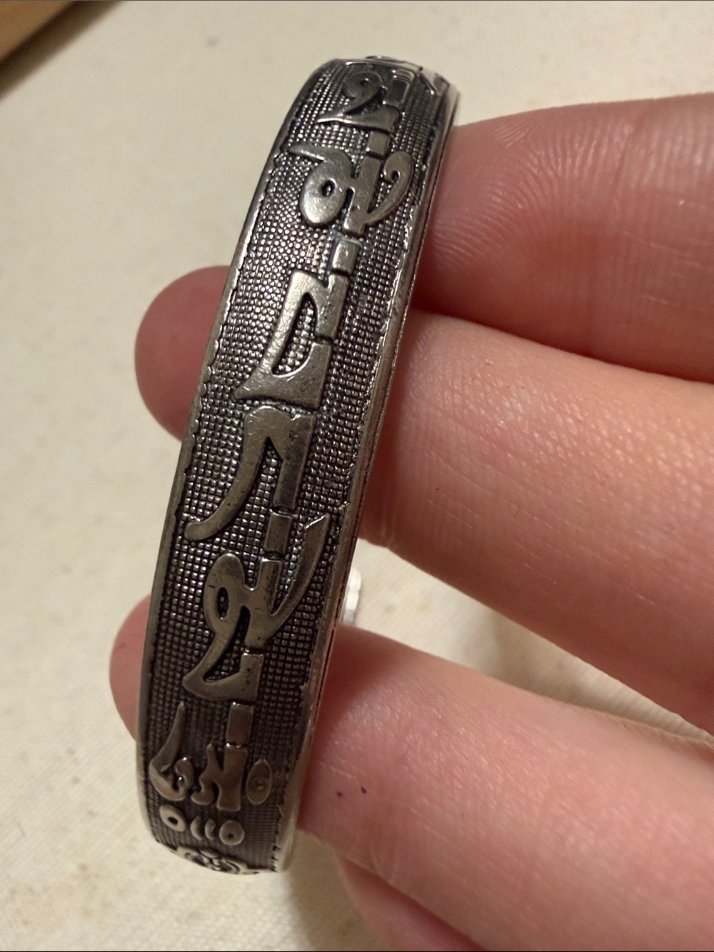 Engraved Silver-Tone Bangle Bracelet with Script Detail